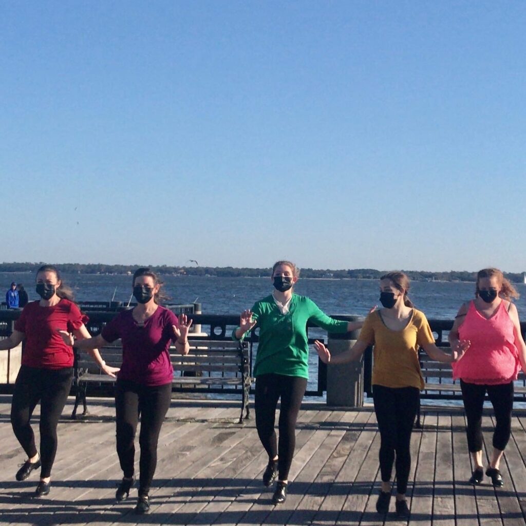 Holy City Hotfoot performs against the stunning backdrop of the Charleston Harbor.
